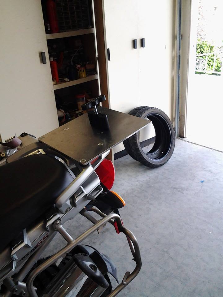 Making necessary changes to the beemer for the AK trip. Some for com
