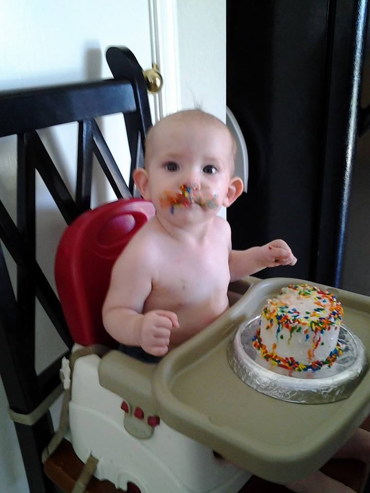 This is how you eat cake on your first birthday. Our great granddaug