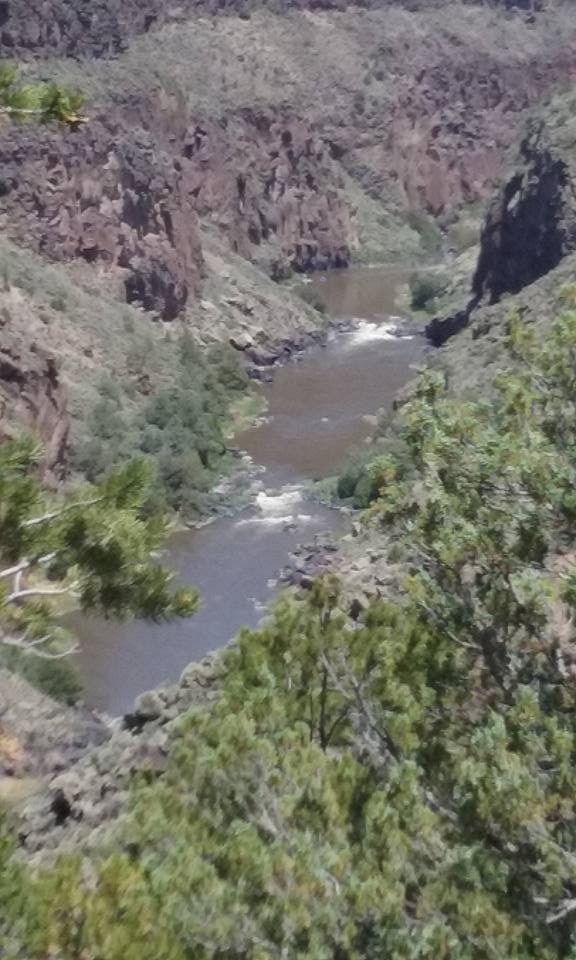 I took a little ride alone today while waiting for everyone to show up at the rally. This is a part of the Rio Grande river that is still free flowing.