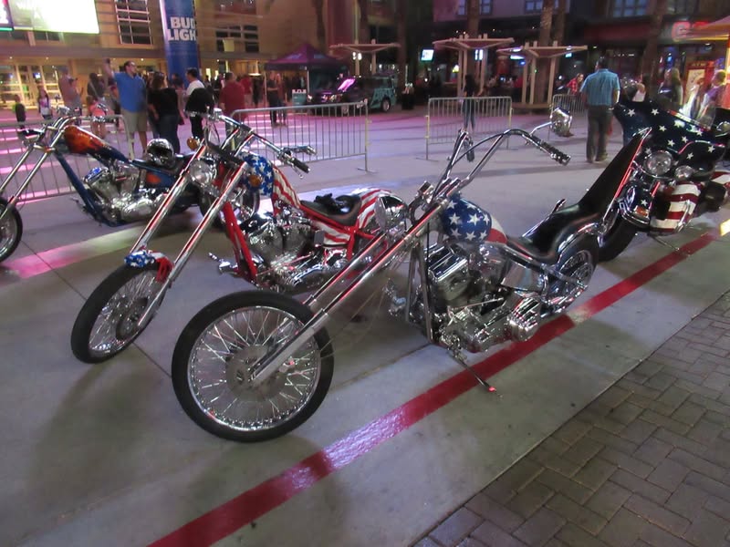 I went to our bike night this evening as it's theme was to honor Veterans. A lot of patriotic bikes, veteran license plates, and even the last surviving vet from Pearl Harbor. A few medals on display as well.