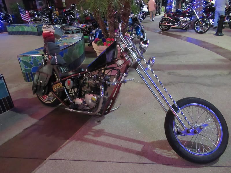 I went to our bike night this evening as it's theme was to honor Veterans. A lot of patriotic bikes, veteran license plates, and even the last surviving vet from Pearl Harbor. A few medals on display as well.