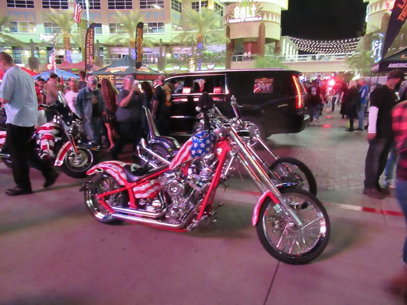 I went to our bike night this evening as it's theme was to honor Veterans. A lot of patriotic bikes, veteran license plates, and even the last surviving vet from Pearl Harbor. A few medals on display as well.