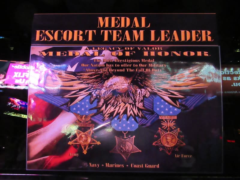 I went to our bike night this evening as it's theme was to honor Veterans. A lot of patriotic bikes, veteran license plates, and even the last surviving vet from Pearl Harbor. A few medals on display as well.