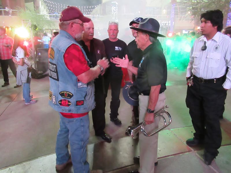 I went to our bike night this evening as it's theme was to honor Veterans. A lot of patriotic bikes, veteran license plates, and even the last surviving vet from Pearl Harbor. A few medals on display as well.
