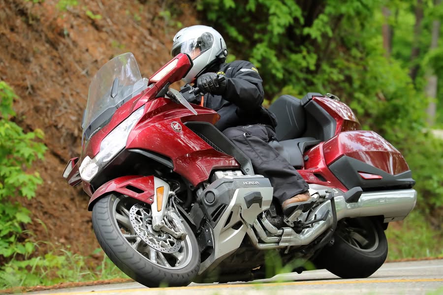 I bought a couple of pics from Hwy 129 photos on the Tail of the Dragon. I rode it on May 18th, 2018. No crazies out there with me today, really fun!