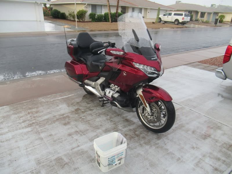 A rare pleasure here in AZ!  Having just returned from a 5,800 mile ride I was able to let my bike sit in a soft rain for 15 minutes to soften the bugs. Usually I'm trying to rinse off the soap before it dries as I run for the hose.