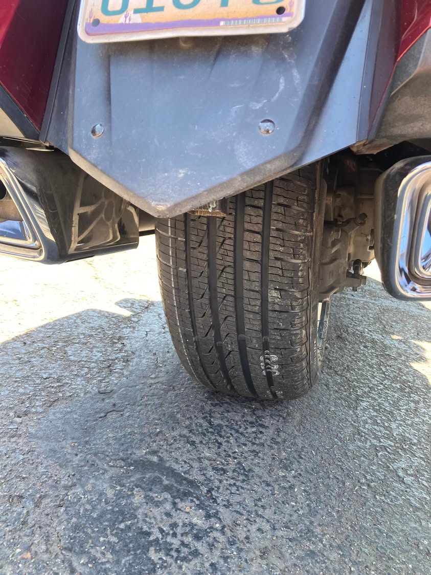 I finally had to get a new rear tire while out on the road. Not as convenient as my lift, but it worked.