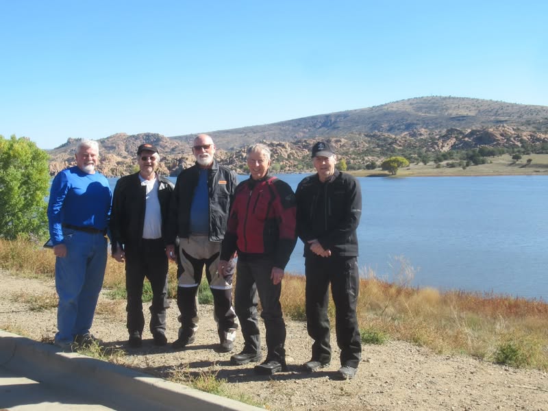 A friendly traveler offered to take a picture of the whole group. Im the one in the blue heavy duty 