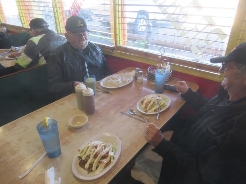 I had the beef tostado, John the chicken tostado, and Dave had a double order of biscuits and gravy 