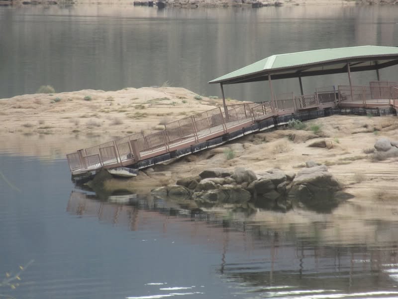 The lake has risen almost up to the floating dock.