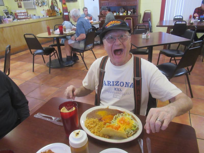 John is so excited that the food finally got here.