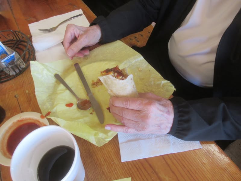 Steve had half of a breakfast burrito.