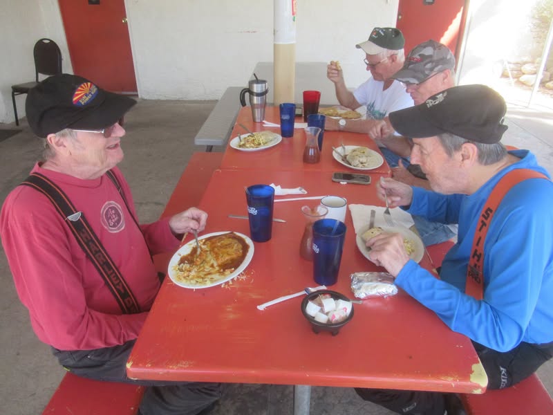 John had enchiladas and scarfed them down , but Steve had the burrito and took half of it home.