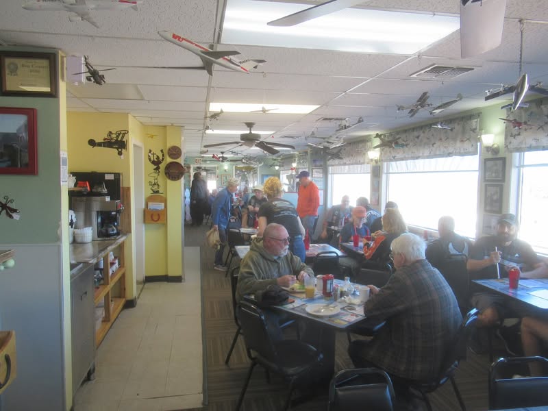 Lots of model airplanes hanging from the ceiling.