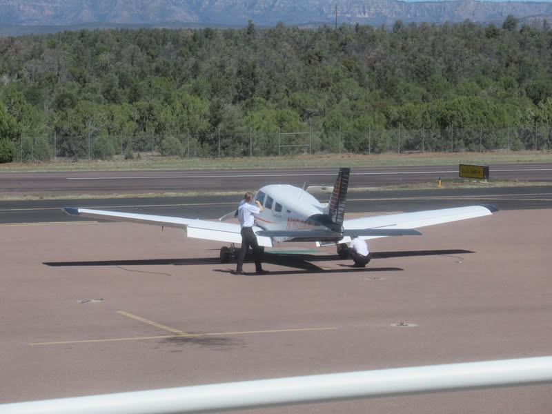 These young pilots were going through their preflight check before taking off.