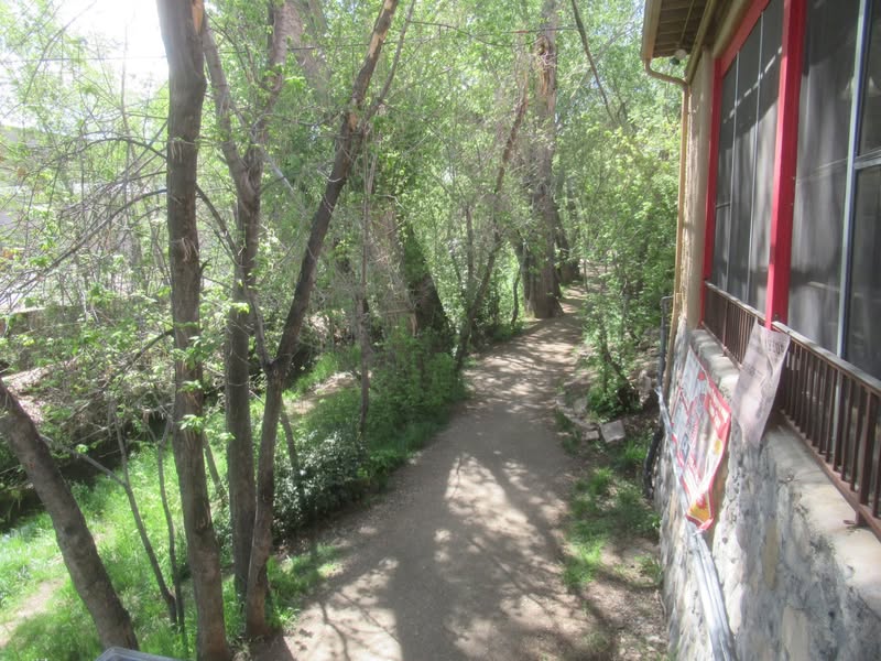 A very pleasant walkway to the patio. I wonder if we could park back there?