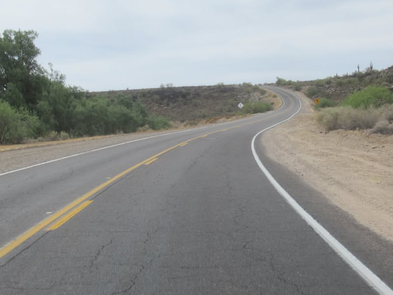 Riding Old US 80 through some scenic agricultural land.