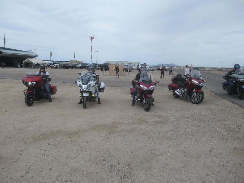 All line up to get a good view of the parachuters.