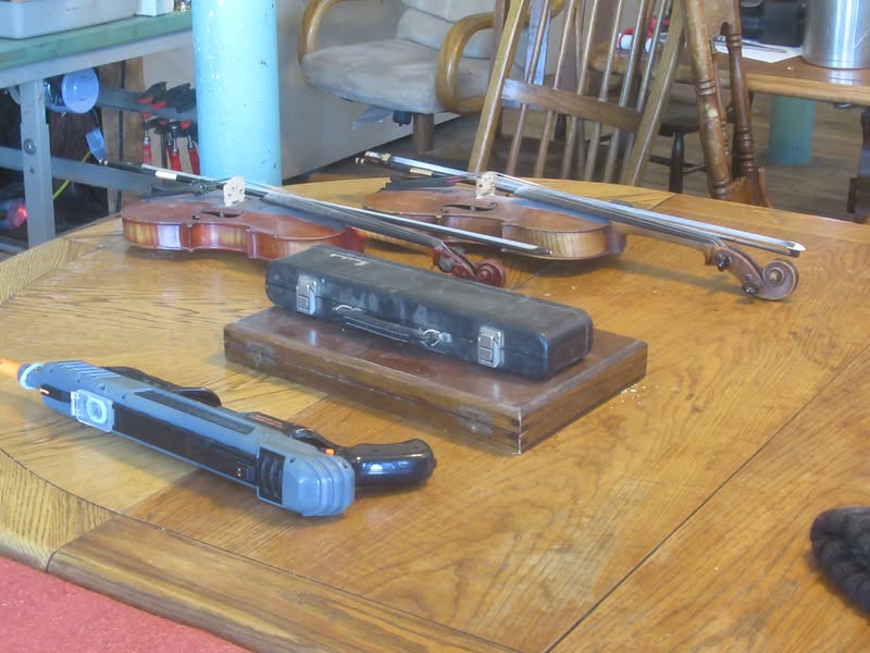 A violin and a viola at the old Skull Valley store.