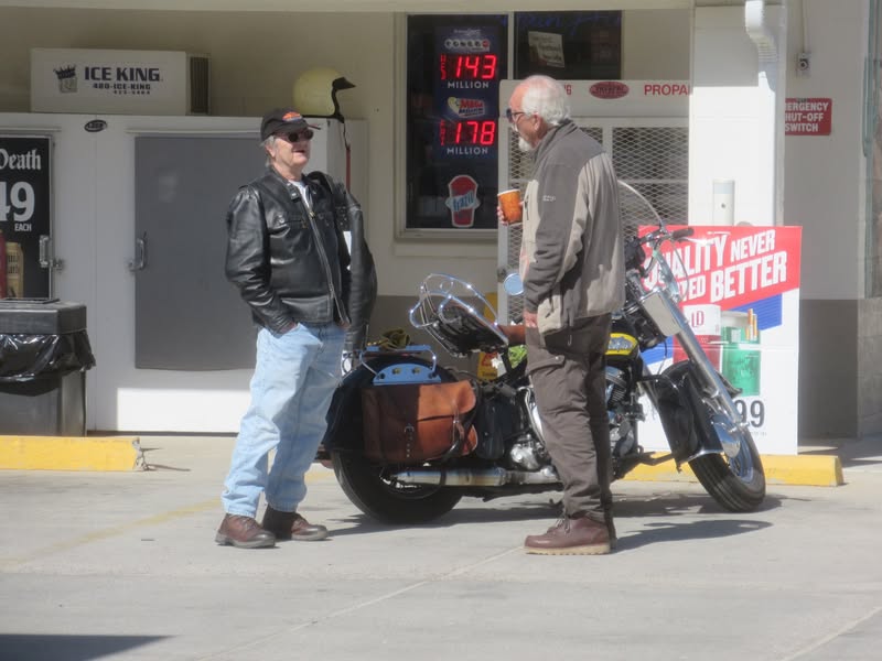 John met the crooked man riding a 56 Harley Pan. He felt bad for him so he took a crooked stance too