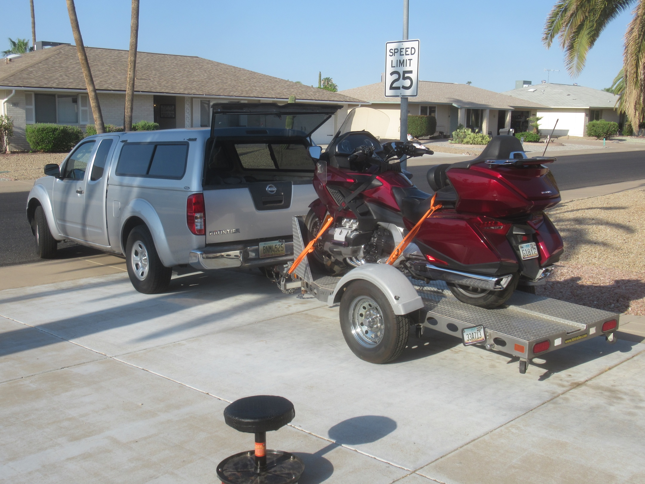The Gold Wing loaded and strapped down on the trailer, ready to go